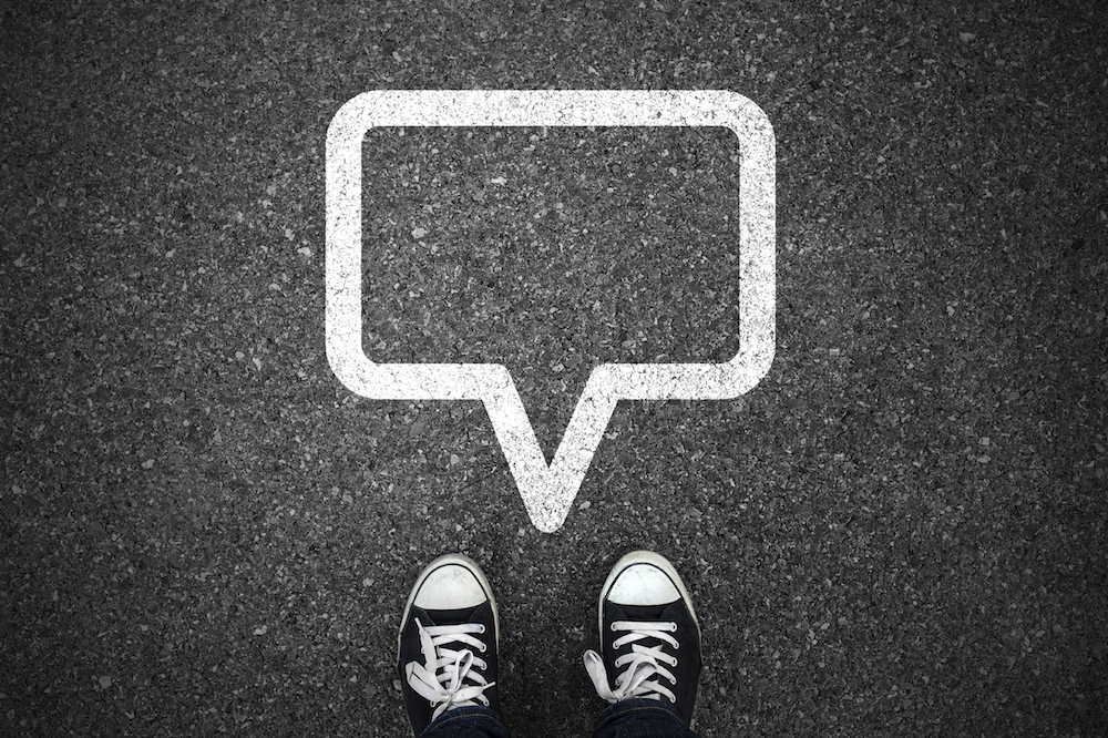 Speech bubble shape on asphalt